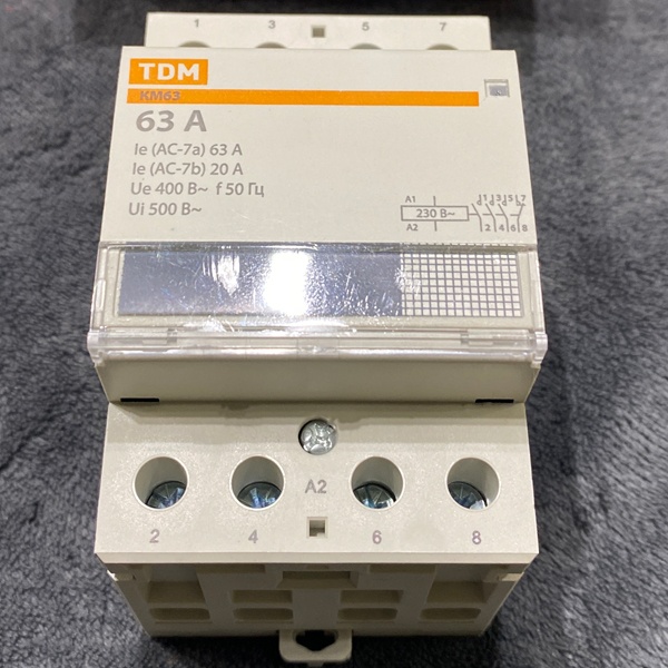 Четырехполюсный модульный контактор КМ63 ТДМ, номинальный ток 63 ампера, 3 нормально-открытых контакта; 1 нормально-закрытый контакт