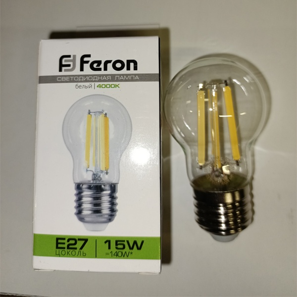 Филаментная лампочка шарик Ферон с нитевидными светодиодами, мощностью 15 Ватт, с цоколем E27, нейтральный белый свет, прозрачная колба
