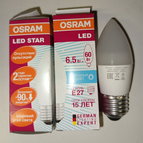 Энергосберегающая LED лампочка свеча мощностью 6,5 Ватт с цоколем E27 нейтральный белый свет