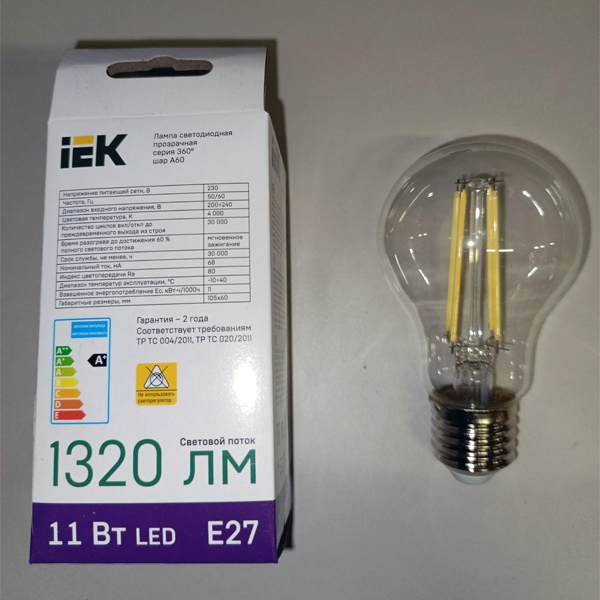 Филаментная лампочка груша с нитевидными светодиодами мощностью 11 Вт с цоколем E27 нейтральный белый свет прозрачная колба