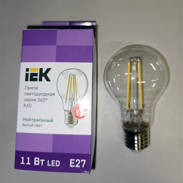 Филаментная лампочка груша с нитевидными светодиодами мощностью 11 Вт с цоколем E27 нейтральный белый свет прозрачная колба