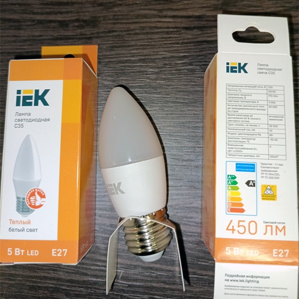 Энергосберегающая LED лампочка свеча мощностью 5 Ватт с цоколем E27 теплый белый свет