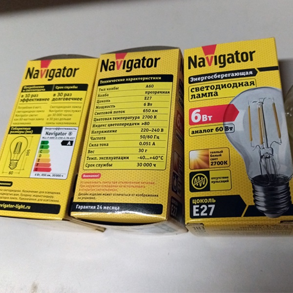 Филаментная лампочка Навигатор с нитевидными светодиодами, мощностью 6 Ватт, с цоколем E27, теплый свет, прозрачная колба