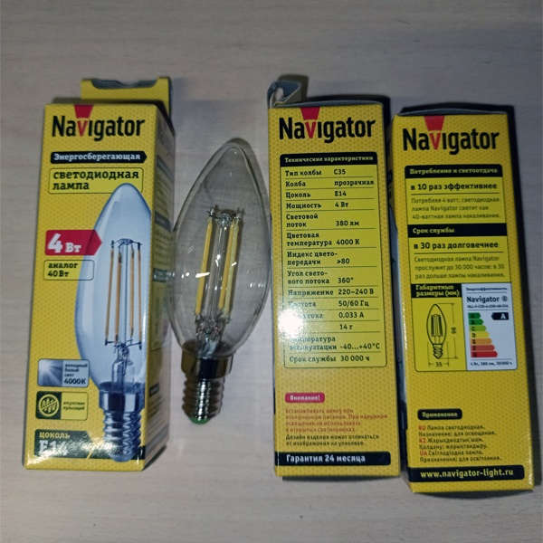 Энергосберегающая LED лампочка свеча с нитевидными светодиодами, мощностью 4 Ватта, с цоколем E14, нейтральный белый свет, прозрачная колба