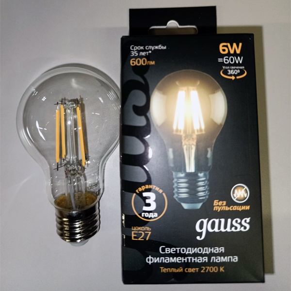 Филаментная лампочка груша с нитевидными светодиодами мощностью 6 Вт с цоколем E27 теплый свет прозрачная колба