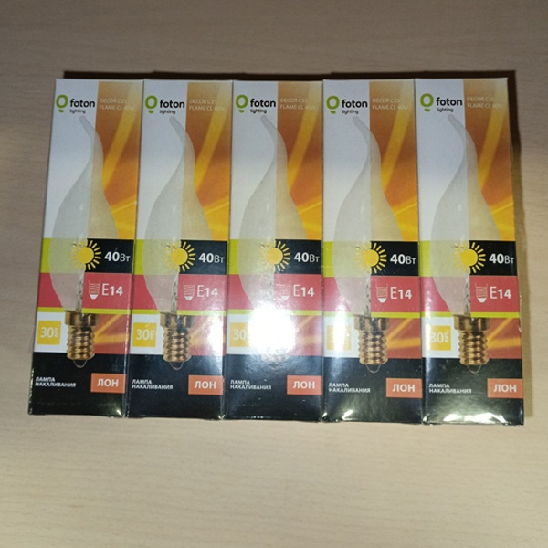 Обычная вольфрамовая лампа формы свеча на ветру мощностью 40 Вт на 220 Вольт с цоколем E14 миньон общего назначения