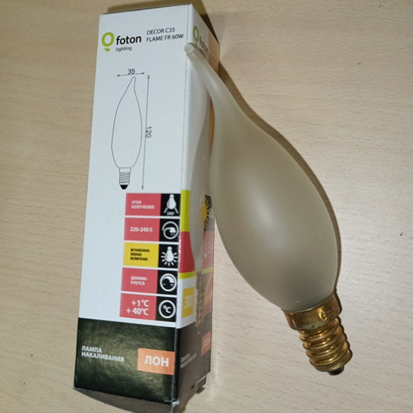 Обычная вольфрамовая лампа формы свеча на ветру мощностью 60 Вт на 220 Вольт с цоколем E14 миньон общего назначения