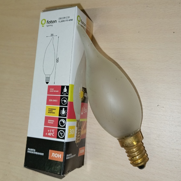 Обычная вольфрамовая лампа формы свеча на ветру мощностью 40 Вт на 220 Вольт с цоколем E14 миньон общего назначения