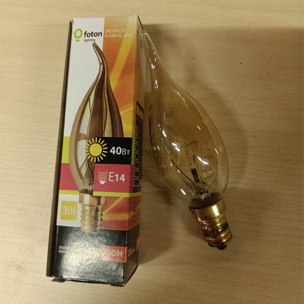 Обычная вольфрамовая лампа формы свеча на ветру мощностью 40 Вт на 220 Вольт с цоколем E14 миньон общего назначения