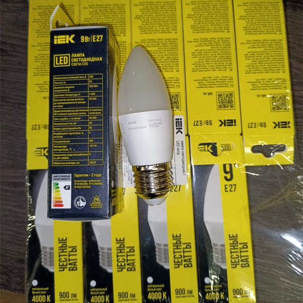 Энергосберегающая LED лампочка свеча мощностью 9 Ватт с цоколем E27 нейтральный белый свет